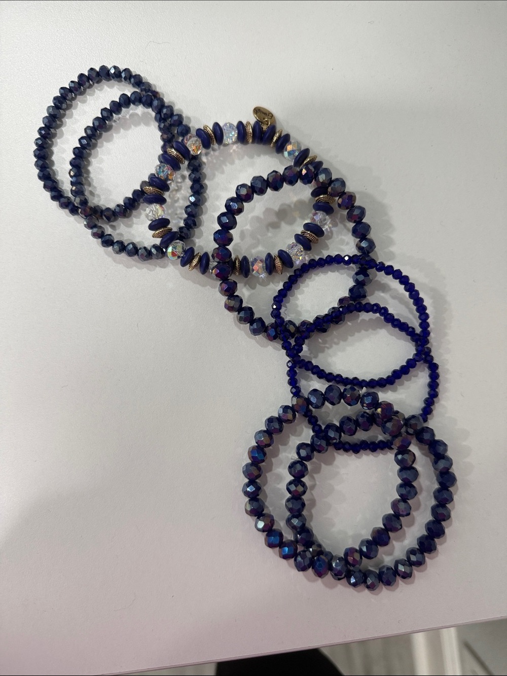 Erimish Black and Cream Beaded Bracelet Stack
Blue. 8 total